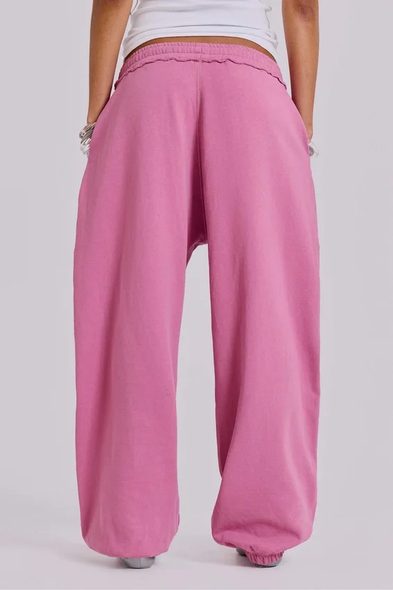 Rosa, weite Monster Joggers mit Umschlag