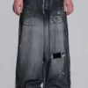 Schwarze, abgenutzte XL Colossus Jeans