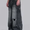 Schwarze, abgenutzte XL Colossus Jeans