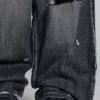Schwarze, abgenutzte XL Colossus Jeans