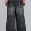 Schwarze, abgenutzte XL Colossus Jeans