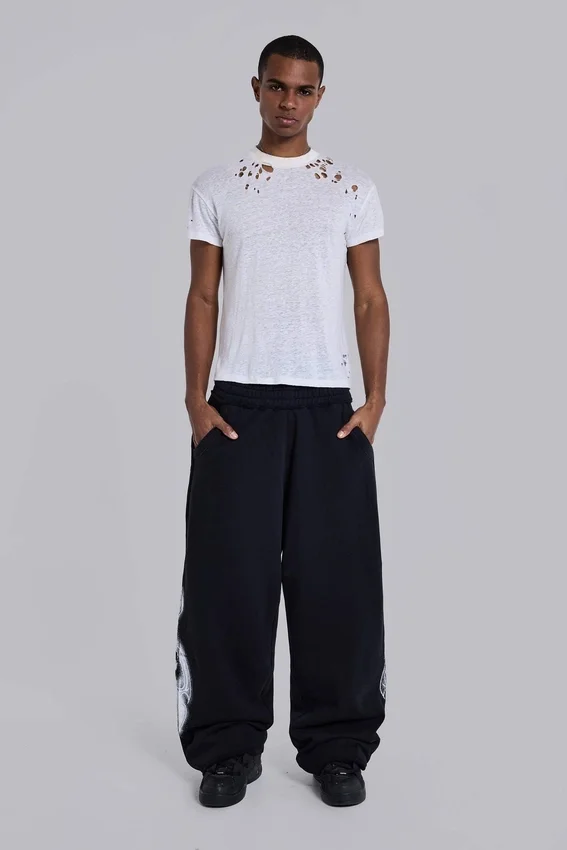 Schwarze Baggy-Monster Joggers mit Gothic-Print