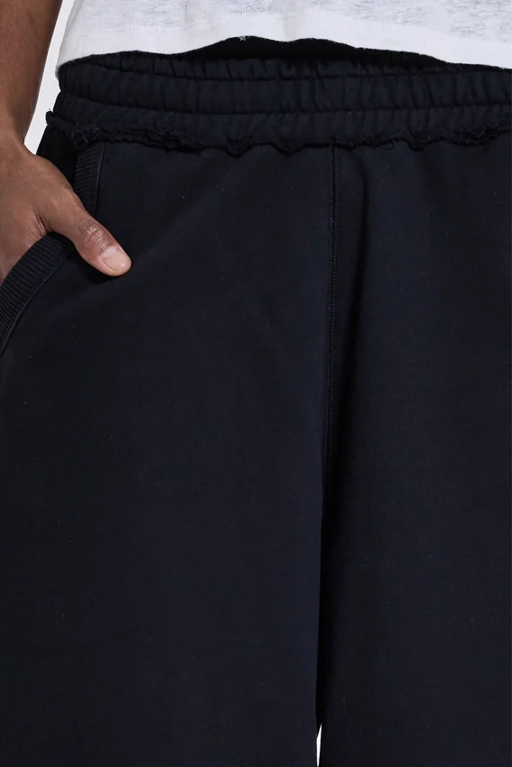 Schwarze Baggy-Monster Joggers mit Gothic-Print