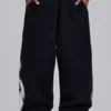 Schwarze Baggy-Monster Joggers mit Gothic-Print