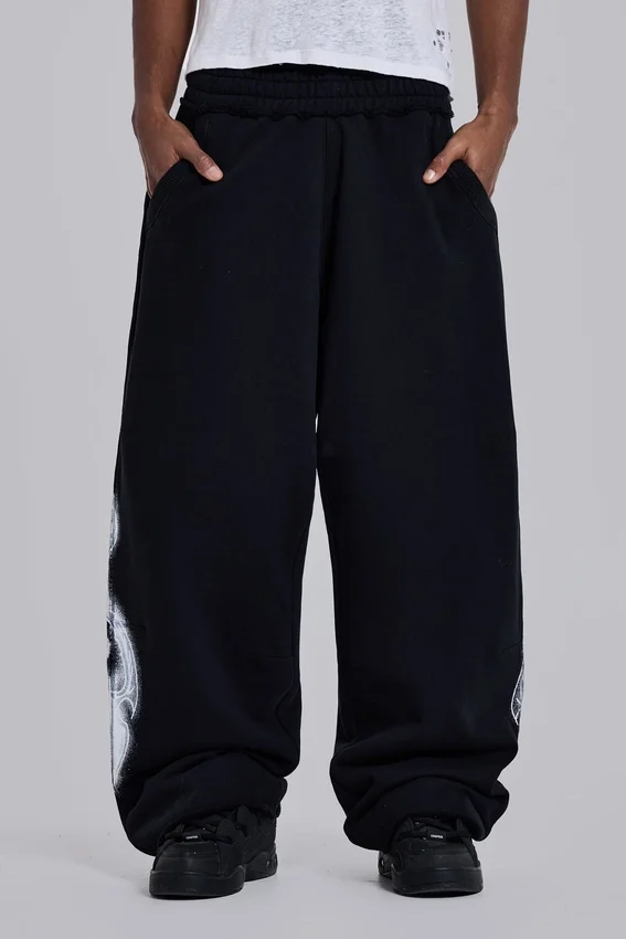 Schwarze Baggy-Monster Joggers mit Gothic-Print