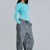 Schwarze Parachute Pants im Oil-Wash-Look