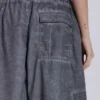 Schwarze Parachute Pants im Oil-Wash-Look
