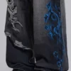 Schwarze Spike Airbrush XL Colossus Jeans mit Rissen
