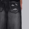 Schwarze Spike Airbrush XL Colossus Jeans mit Rissen