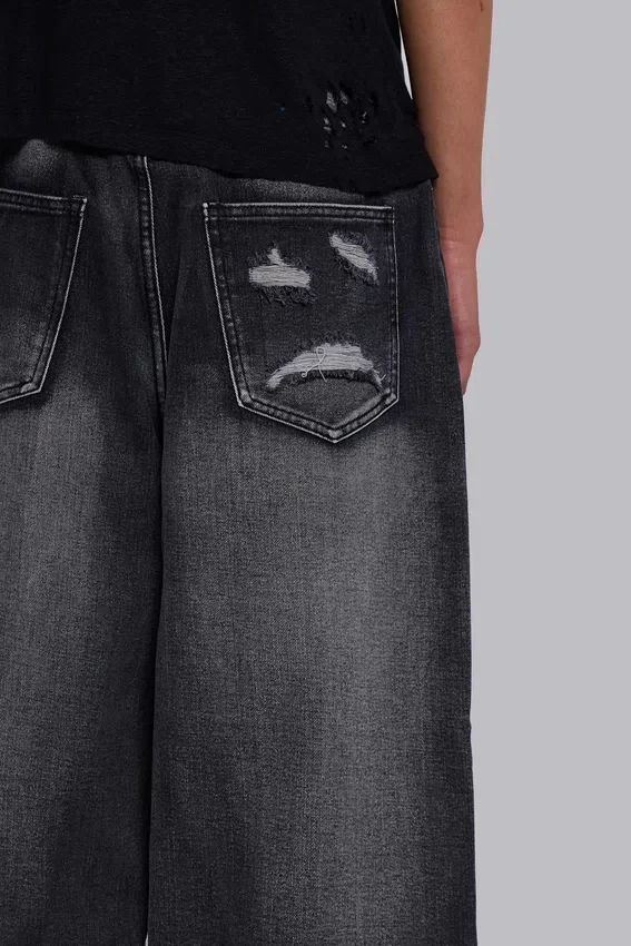 Schwarze Spike Airbrush XL Colossus Jeans mit Rissen