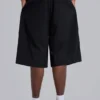 Schwarze, taillierte Goliath-Baggy-Shorts