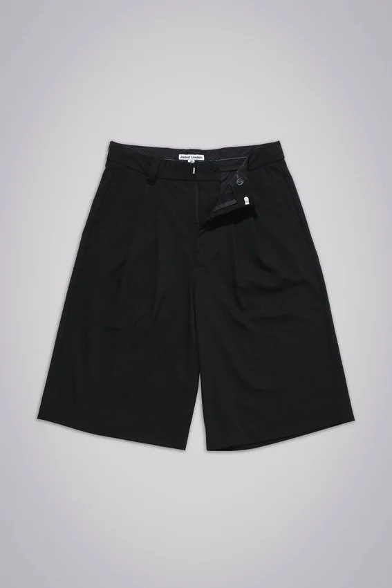 Schwarze, taillierte Goliath-Baggy-Shorts