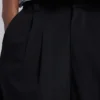 Schwarze, taillierte Goliath-Baggy-Shorts