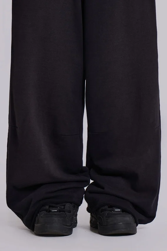 Schwarze, weit geschnittene Monster Joggers