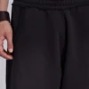 Schwarze, weite „Monster Joggers“ mit Umschlag