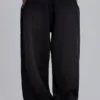 Schwarze, weite „Monster Joggers“ mit Umschlag
