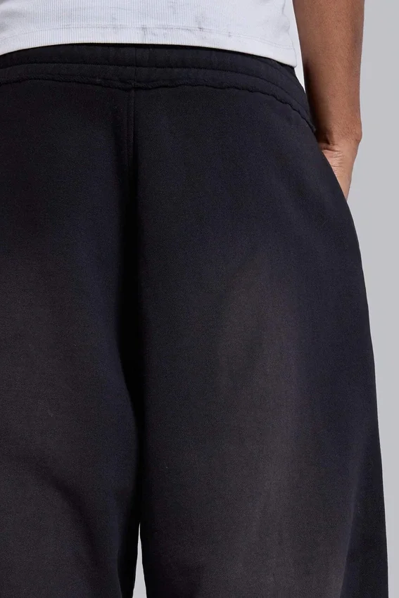 Schwarze, weite „Monster Joggers“ mit Umschlag