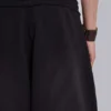 Schwarze, weite „Monster Joggers“ mit Umschlag