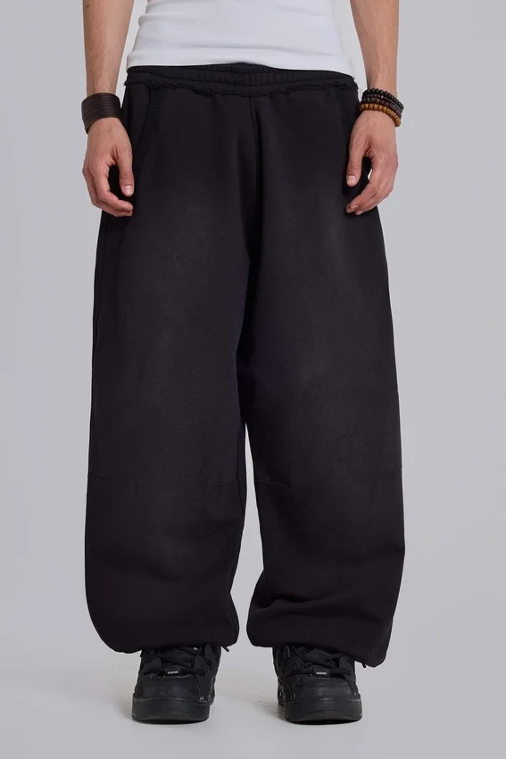 Schwarze, weite „Monster Joggers“ mit Umschlag