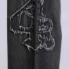 Schwarze XL Colossus Jeans mit erhabener Stickerei