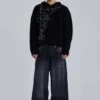 Verwaschene schwarze Colossus Jeans