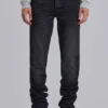 Verwaschene schwarze Drain-Jeans