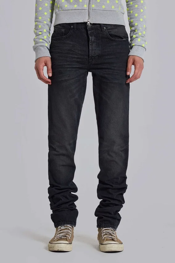 Verwaschene schwarze Drain-Jeans