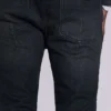 Verwaschene schwarze Drain-Jeans