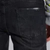 Verwaschene schwarze Drain-Jeans