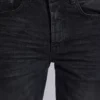 Verwaschene schwarze Drain-Jeans