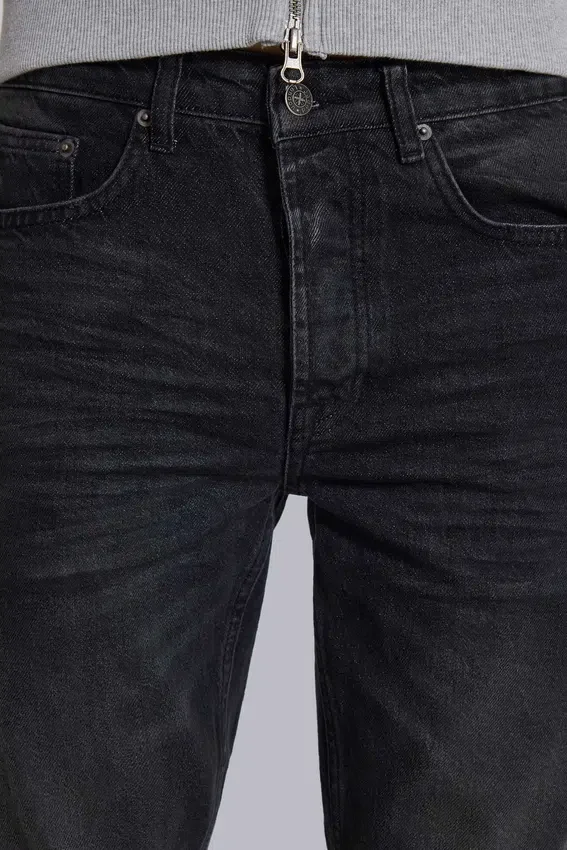 Verwaschene schwarze Drain-Jeans