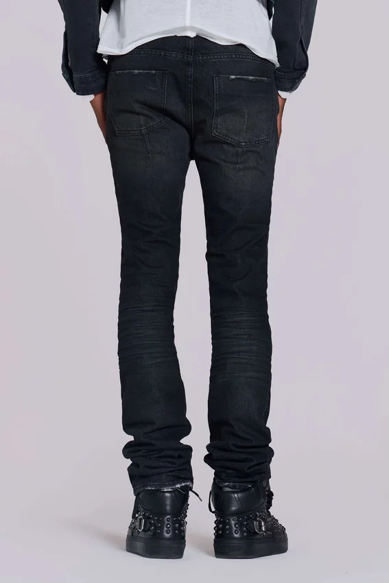 Verwaschene schwarze Drain-Jeans